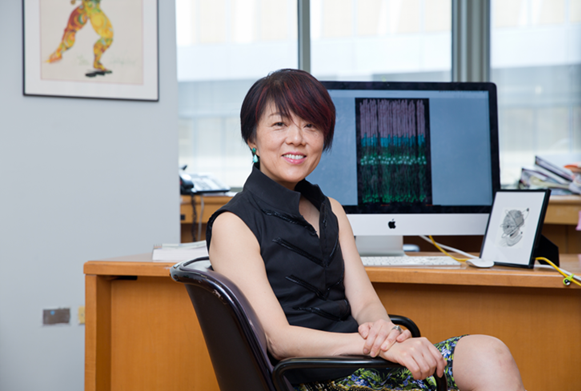 a woman at her desk 